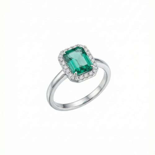 Anillo Oro Blanco 18kt con 24 Brillantes 0.10ct GVS y Esmeralda Natural 8x6mm 1.45ct