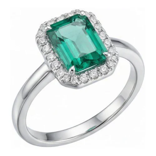 Anillo Oro Blanco 18kt con 24 Brillantes 0.10ct GVS y Esmeralda Natural 8x6mm 1.45ct